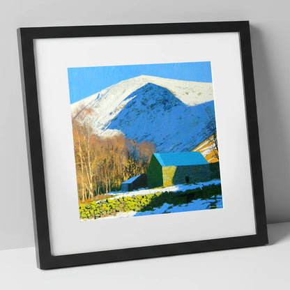 Snowy Bowscale Fell and Stone Barn lake district fell art print in black frame