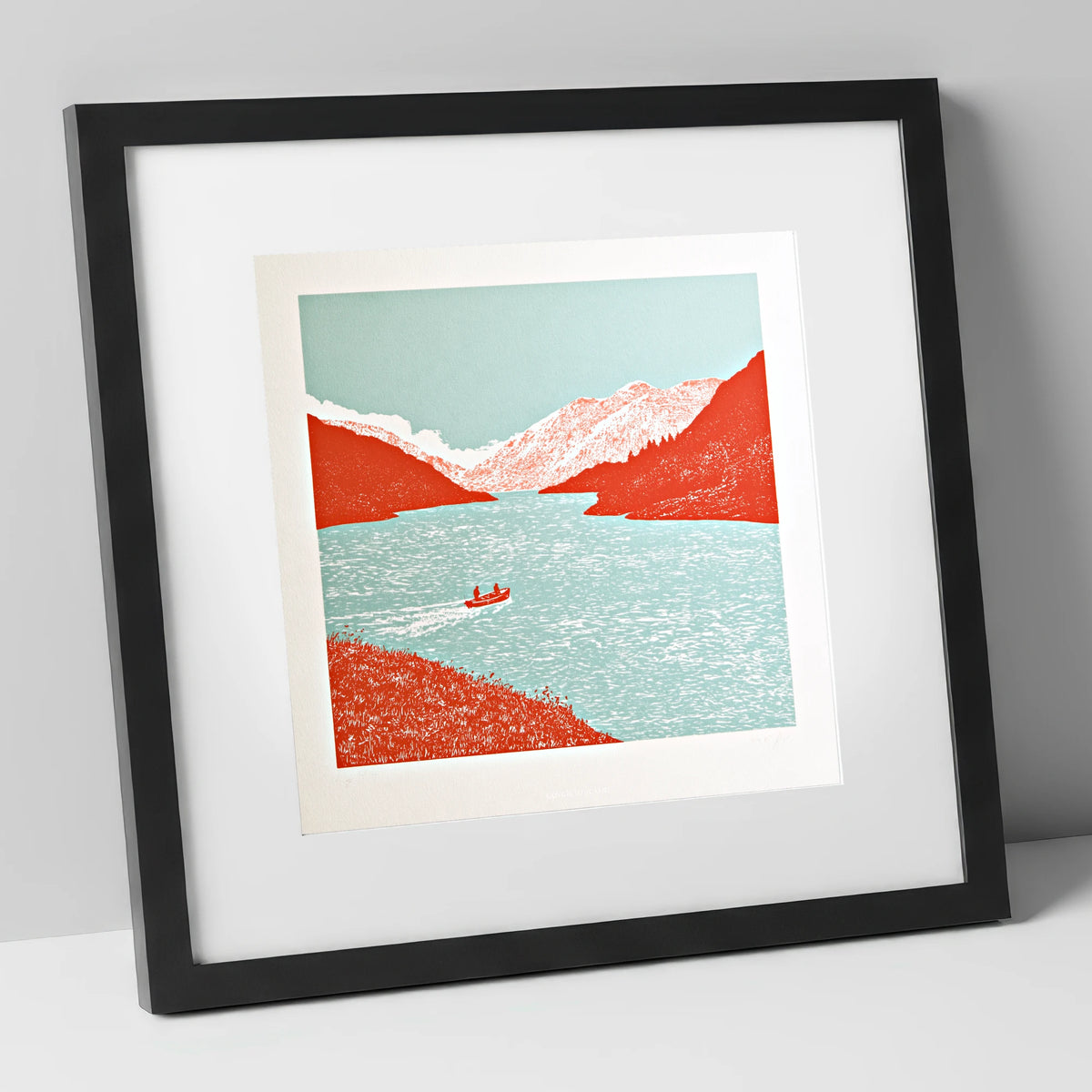 Coniston Water in Vivid Red lake district lake art print in black frame