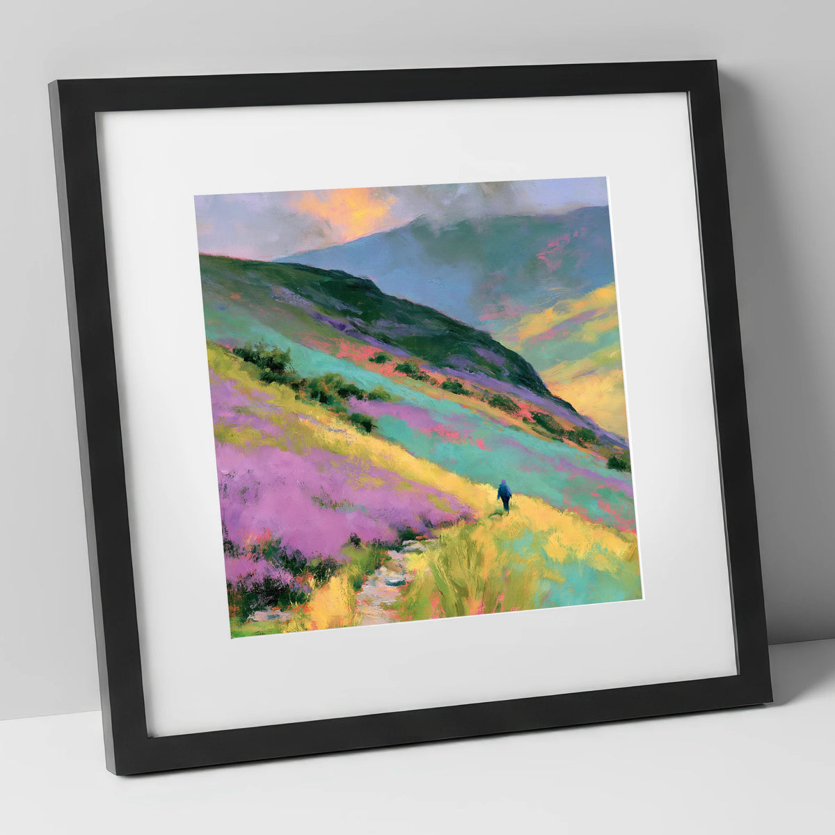 Lone Walker on Vivid Fells lake district walking art print in black frame