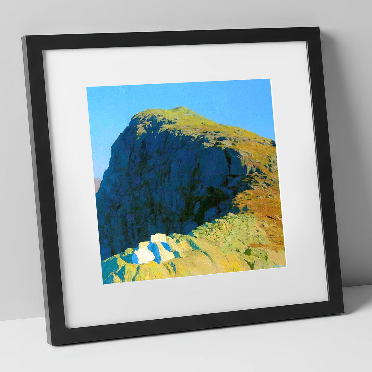 Sunlit Crags of Harrison Stickle lake district fell art print in black frame