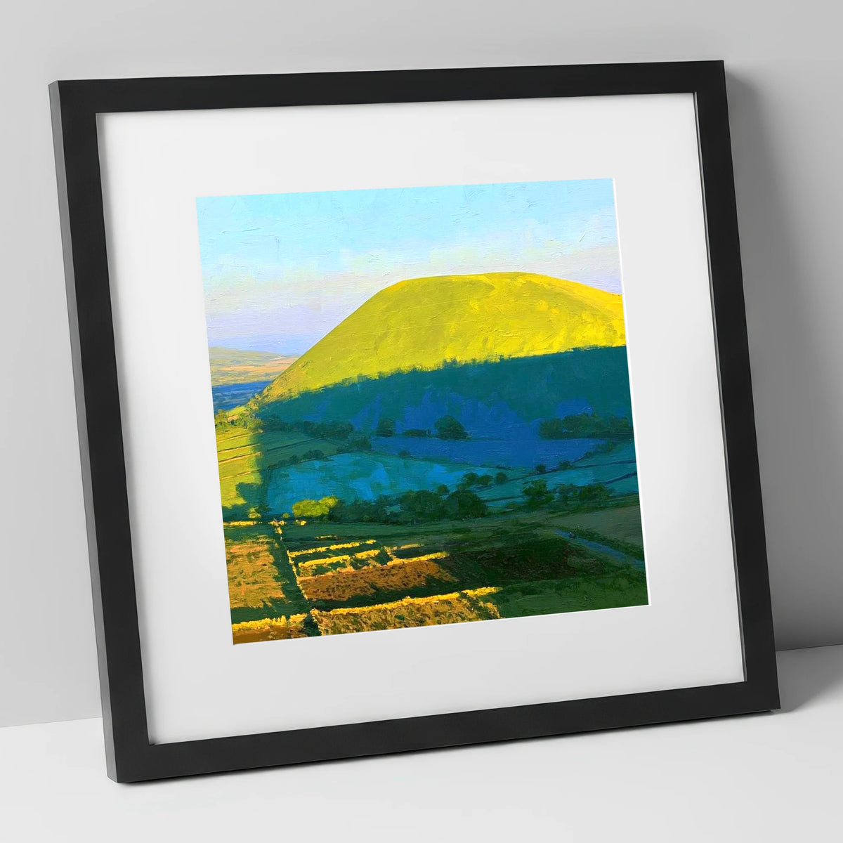 Great Mell Fell Sunlit Dome lake district fell art print in black frame