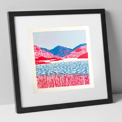 Vibrant Pink Fells and Lake lake district lake art print in black frame