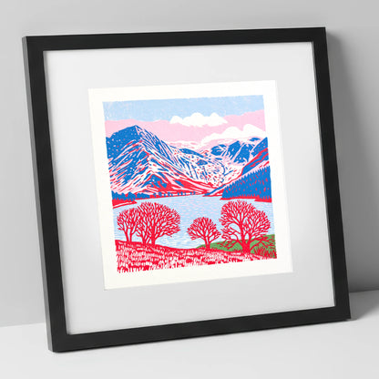 Graphic Buttermere in Red and Blue lake district lake art print in black frame