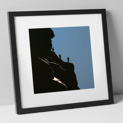 Silhouetted Climbers on a Crag lake district walking art print in black frame