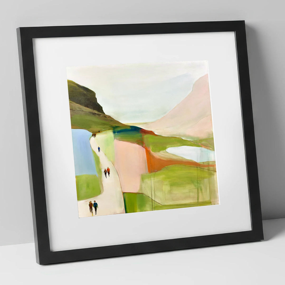 Walkers on a Bright Mountain Path lake district walking art print in black frame