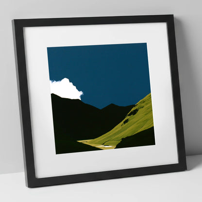 Sunlit Fell Under Storm Cloud lake district sky art print in black frame