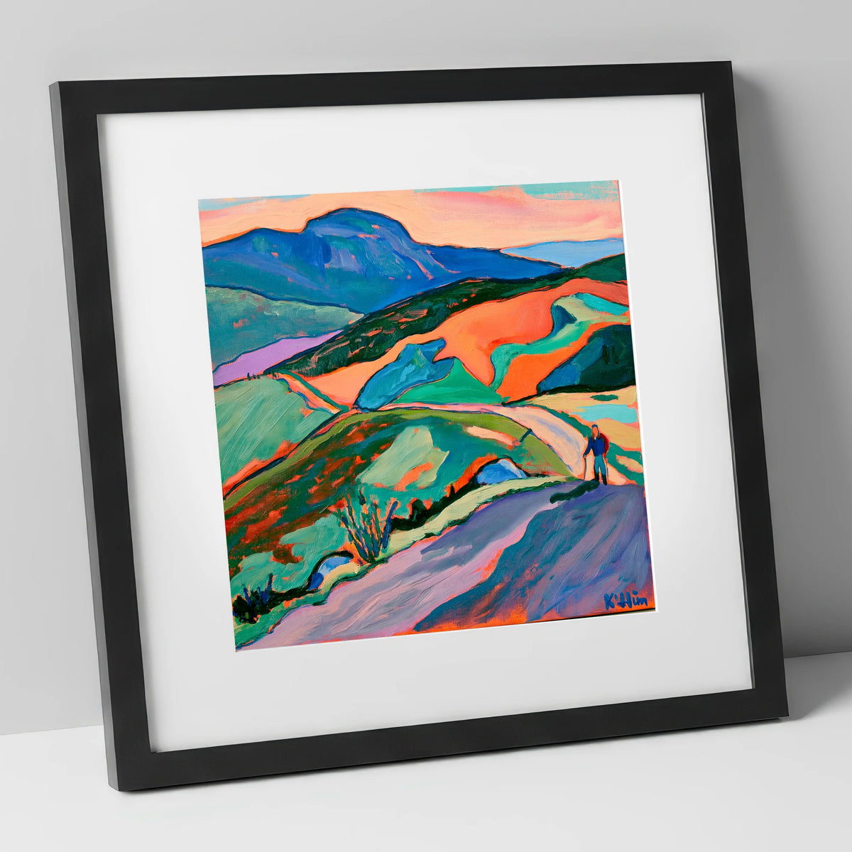 Lone Hiker on Colourful Fells lake district walking art print in black frame