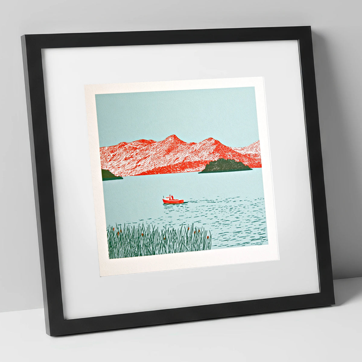 Derwentwater Fells in Vivid Red lake district lake art print in black frame