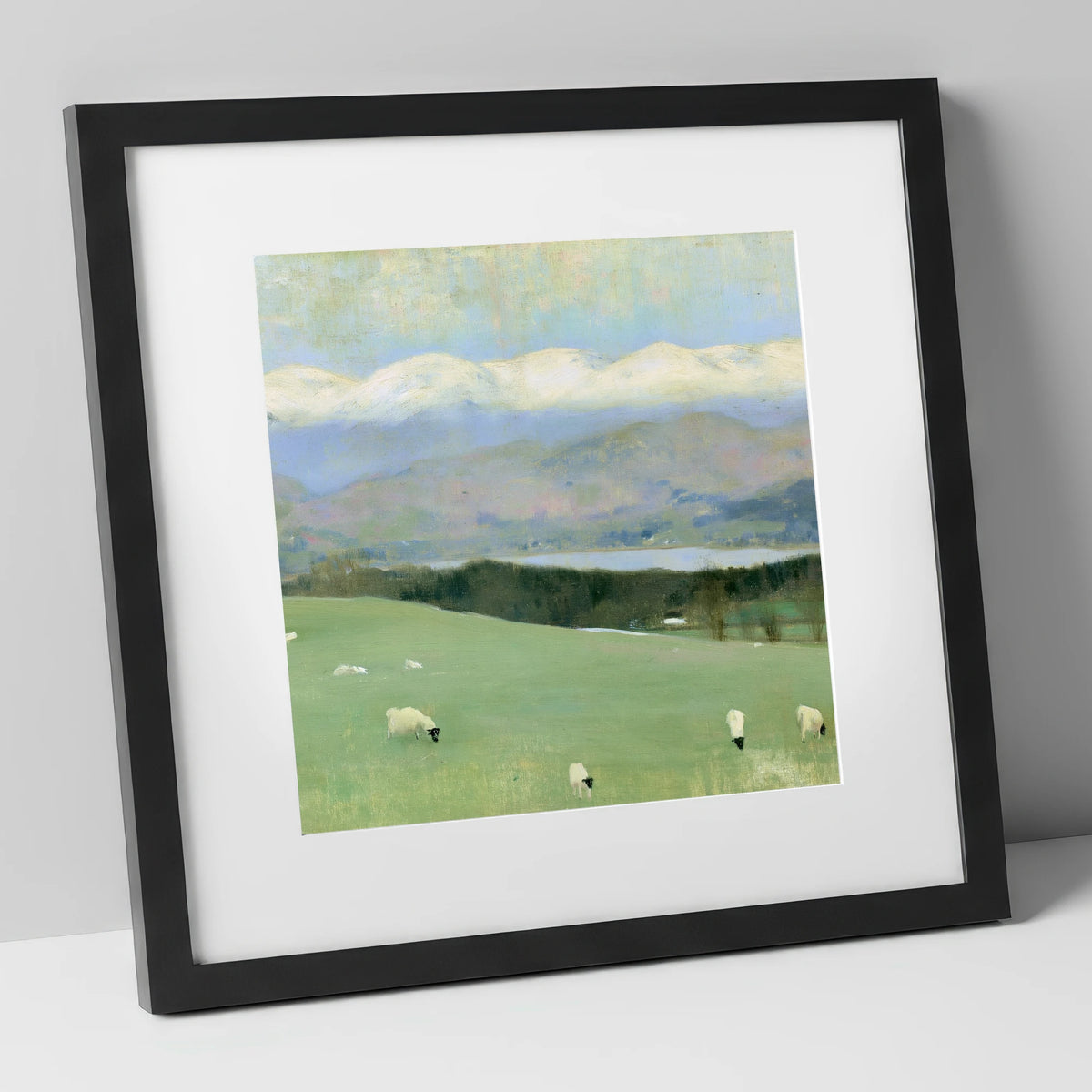 Hawkshead Pastures and Snow-Capped Fells lake district village art print in black frame