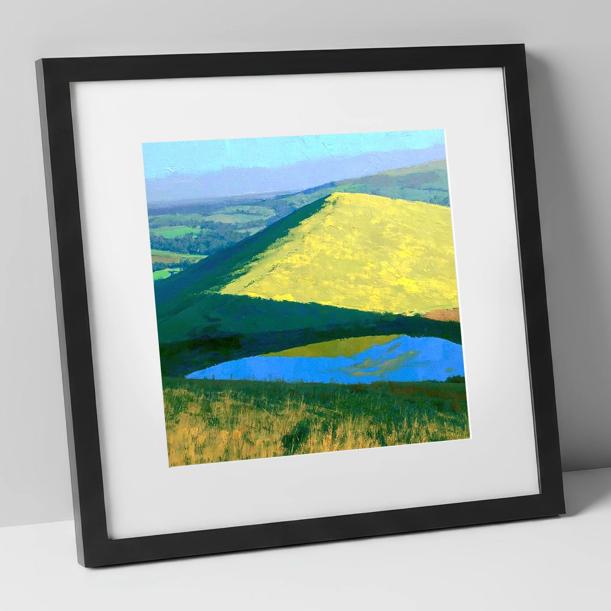 Bright Sunlight on Longlands Fell lake district fell art print in black frame