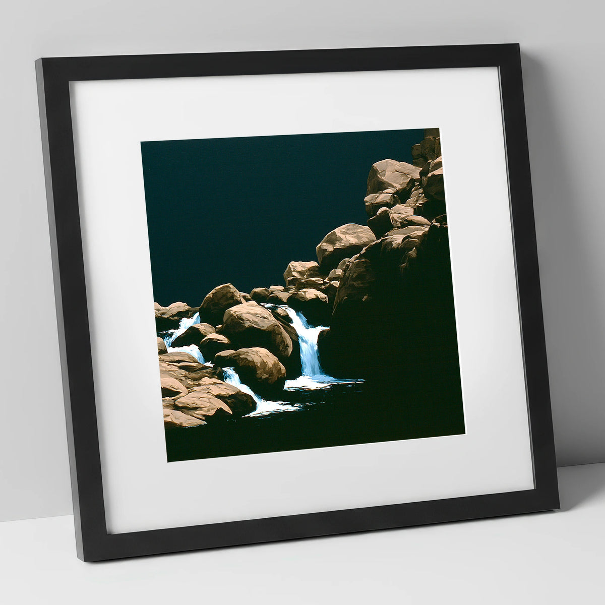 Tumbling Waterfall Among Sunlit Boulders lake district waterfall art print in black frame