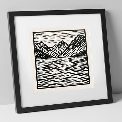 Monochrome Fells and Lake Reflections lake district lake art print in black frame