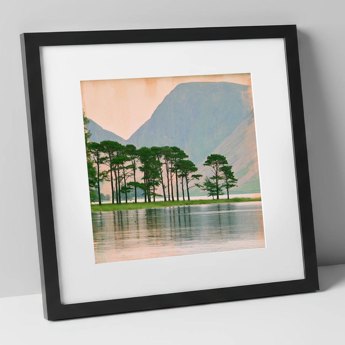 Buttermere Pines in Still Water lake district lake art print in black frame