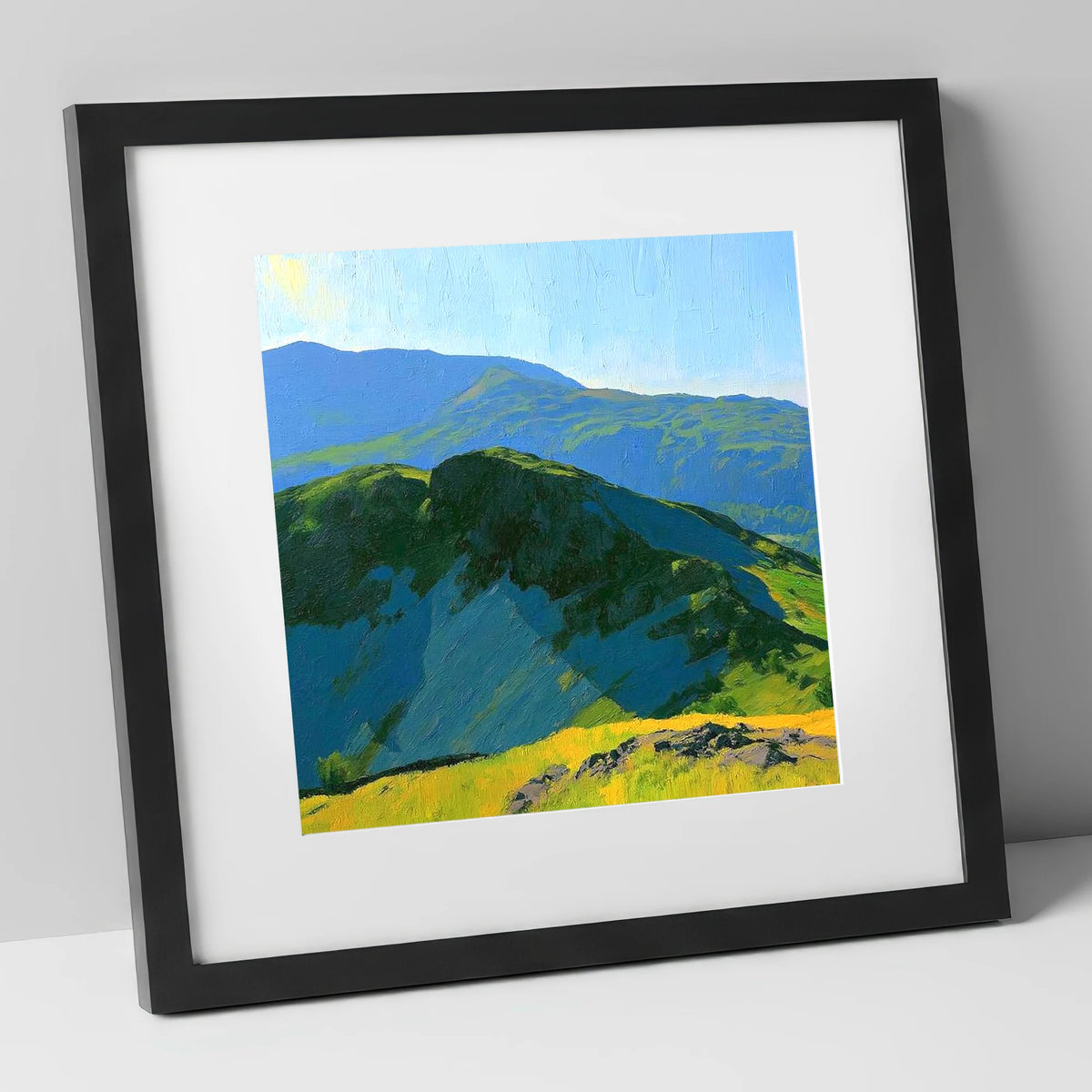 Sunlit Crags of Holme Fell lake district fell art print in black frame