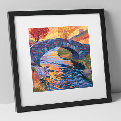 Stone Bridge over a Golden Beck lake district waterfall art print in black frame