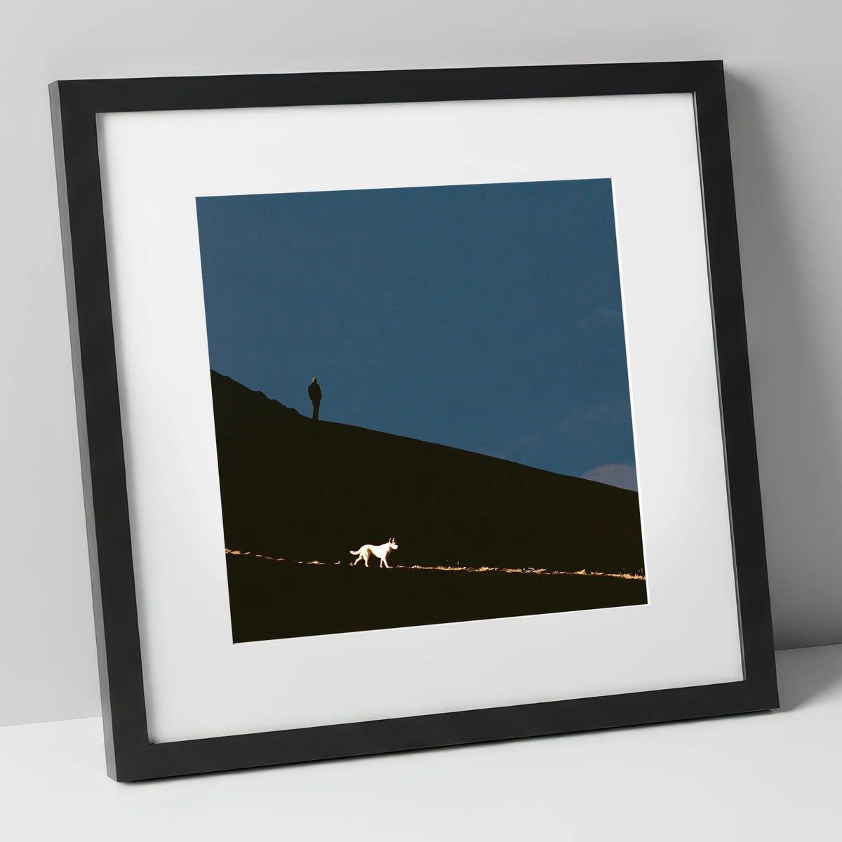 Skiddaw Silhouette Walker and Dog gifts for dog walkers art print in black frame