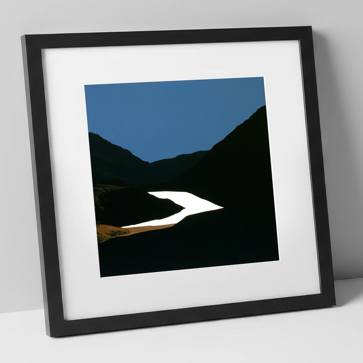 Luminous Lake Below Dark Fells lake district lake art print in black frame