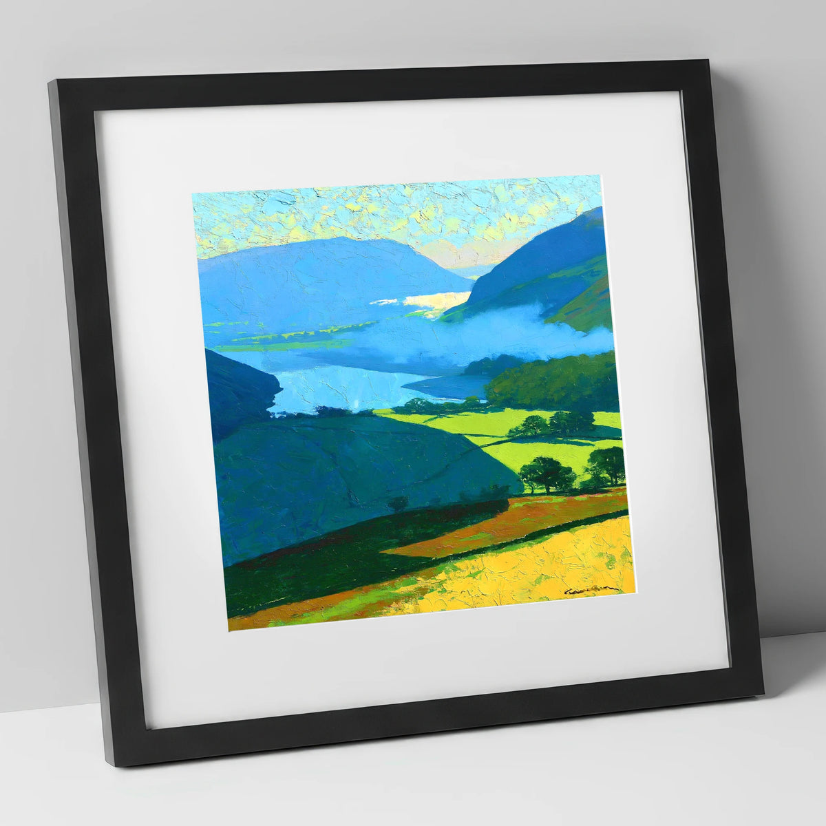 Misty Valley and Sunlit Lakeland Fields lake district sky art print in black frame