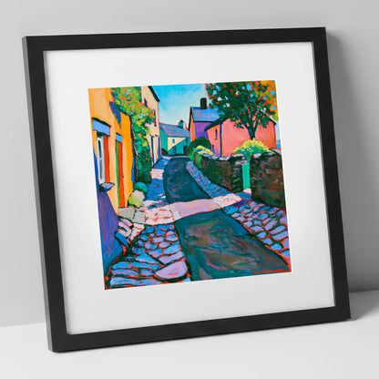 Vibrant Cobbled Village Street lake district village art print in black frame