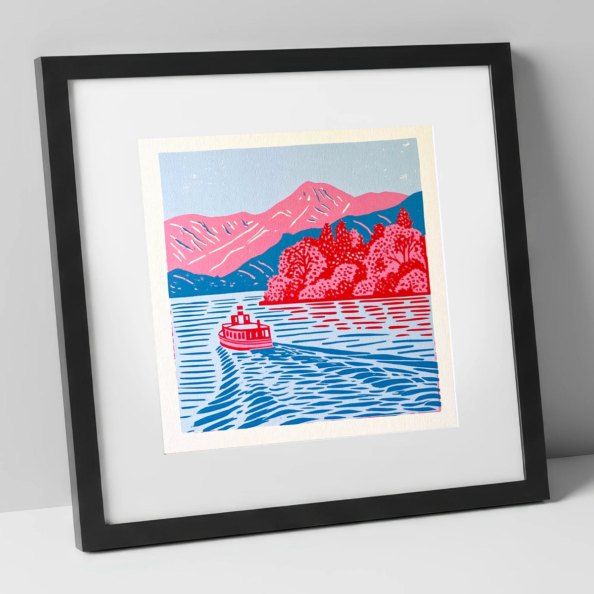 Vibrant Derwentwater Boat and Fells lake district lake art print in black frame
