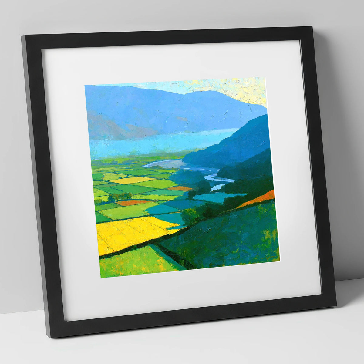 Sunlit Valley Fields and Winding River lake district sky art print in black frame