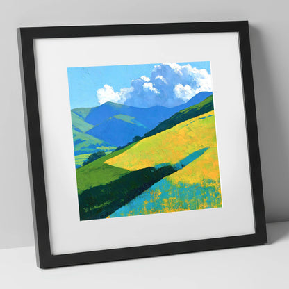 Sunlit Fells in Cerulean and Gold lake district fell art print in black frame