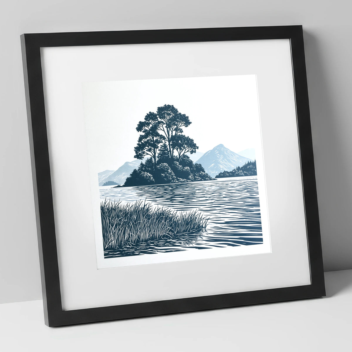 Derwentwater Island in Slate Blue lake district lake art print in black frame