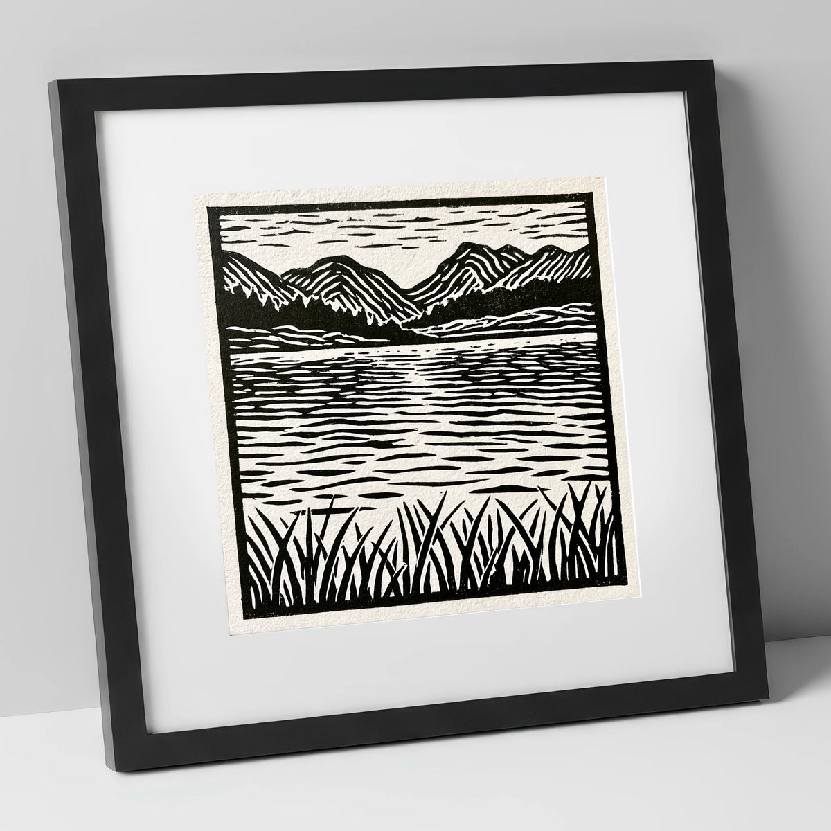 Calm Lake Reflections in Monochrome lake district lake art print in black frame