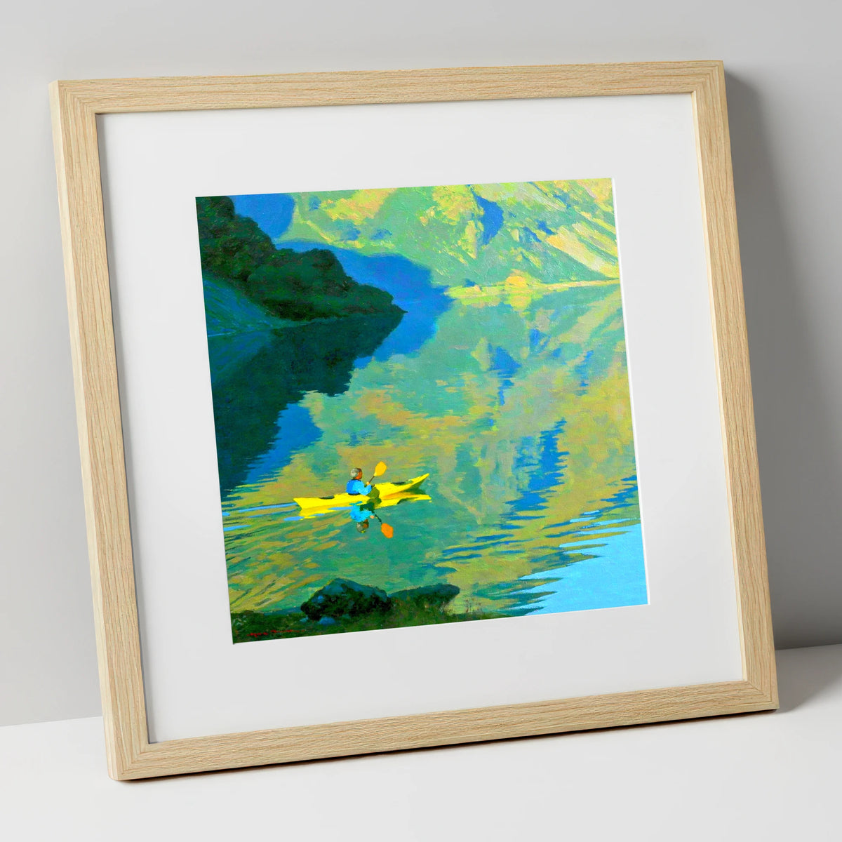 Yellow Kayak on Reflecting Fells lake district walking art print in natural frame