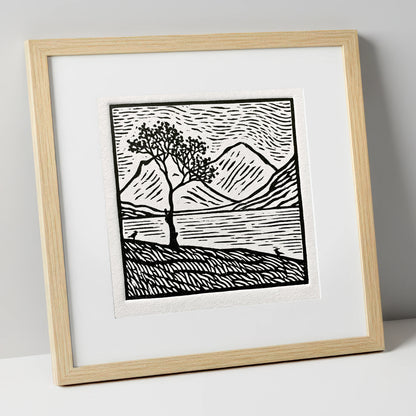 Monochrome Buttermere and Lone Tree lake district lake art print in natural frame