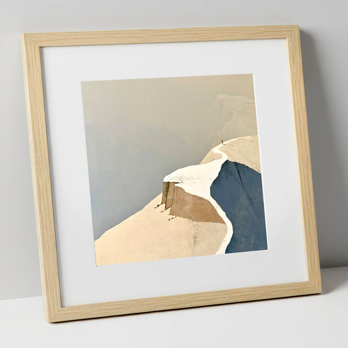 Lone Walker on a Snowy Summit Ridge lake district fell art print in natural frame