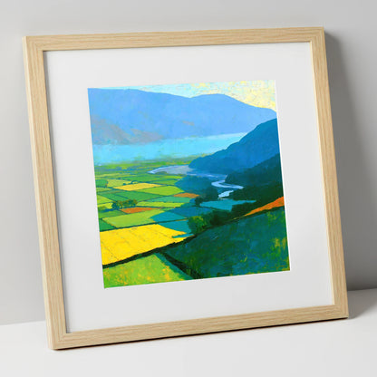 Sunlit Valley Fields and Winding River lake district sky art print in natural frame