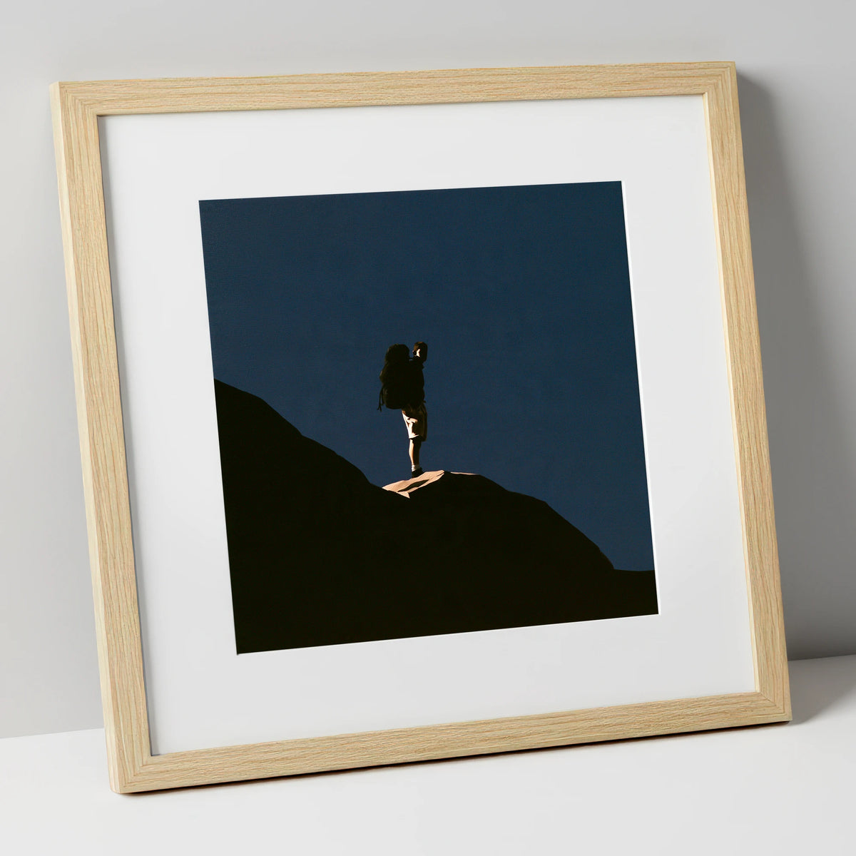 Hiker Silhouette on Dark Fell lake district walking art print in natural frame