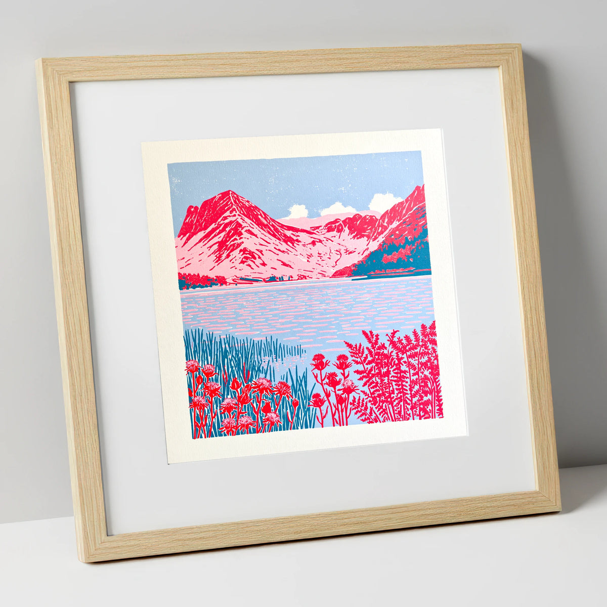 Bold Pink Fells of Buttermere lake district lake art print in natural frame