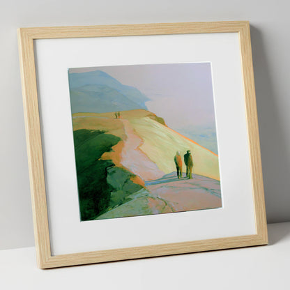 Hikers on a Golden Fell lake district fell art print in natural frame