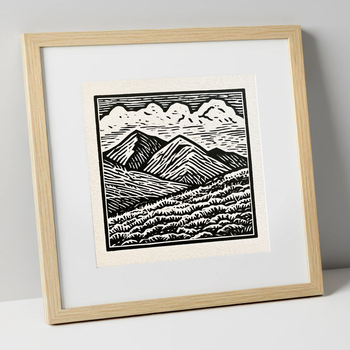 Monochrome Rolling Fells Under Cloud lake district fell art print in natural frame
