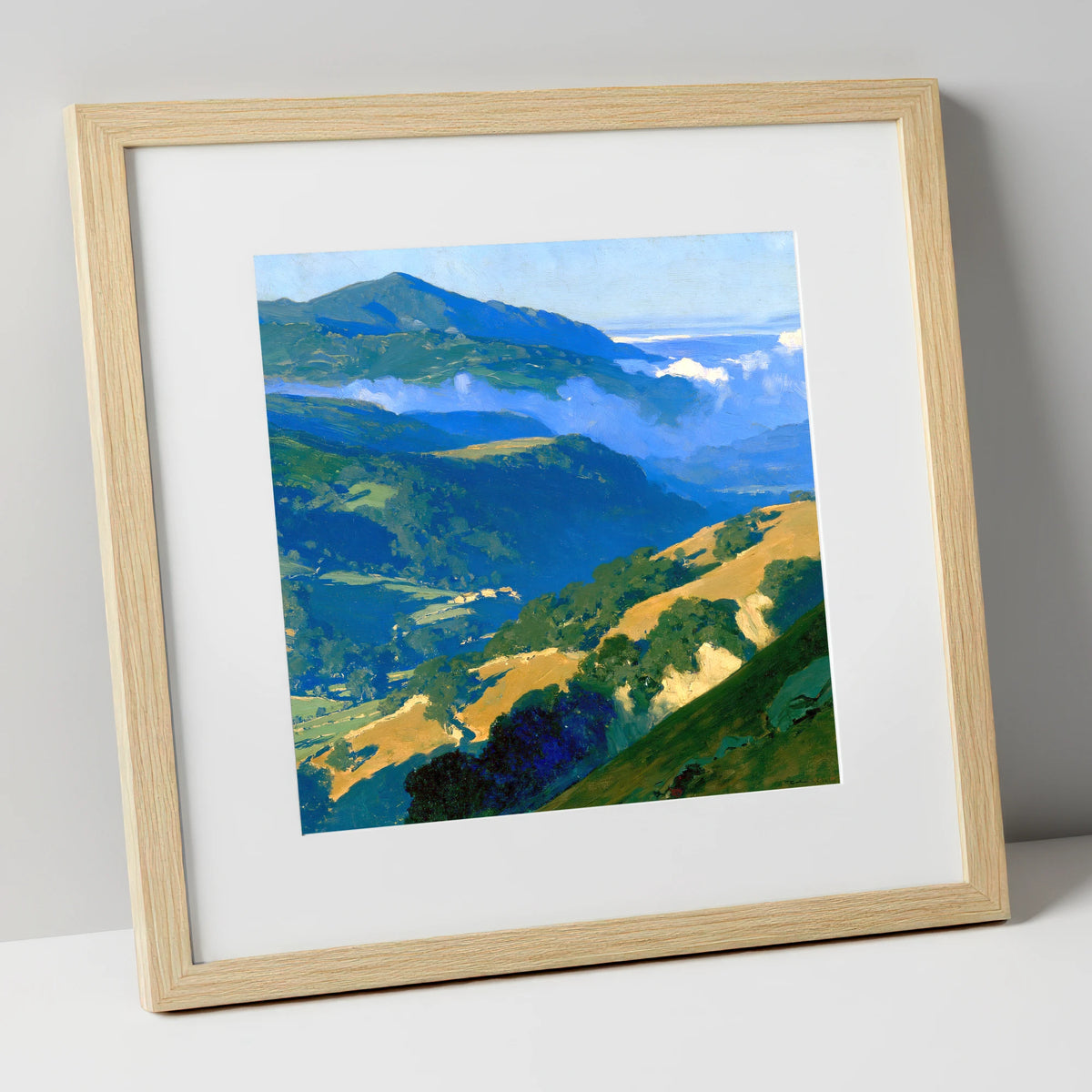 Sunlit Fells and Valley Mist lake district sky art print in natural frame
