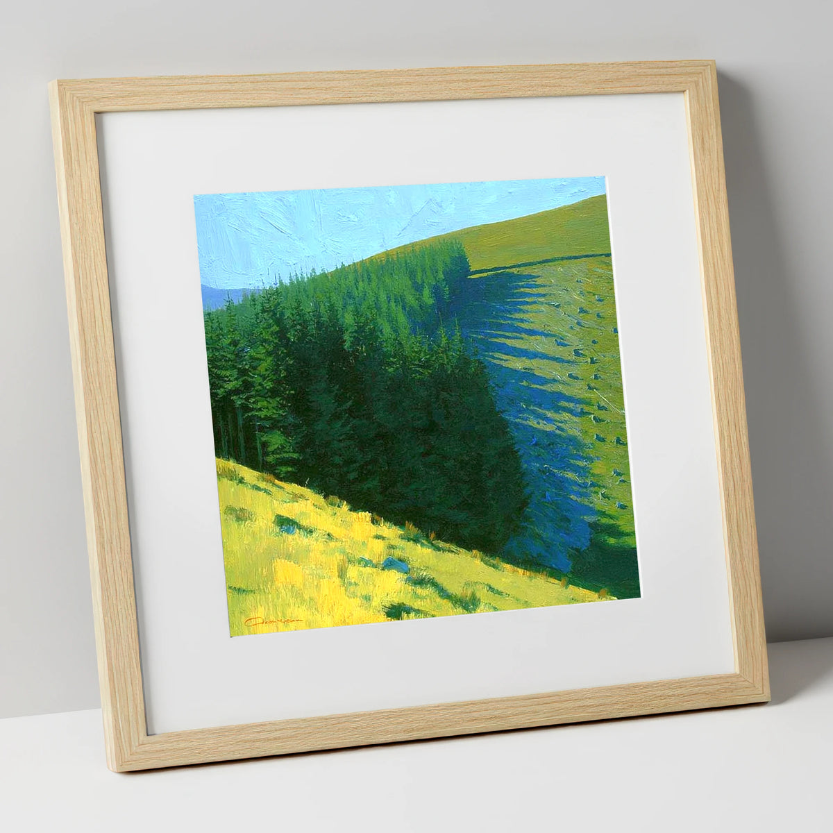 Conifer Shadows on Broom Fell lake district fell art print in natural frame