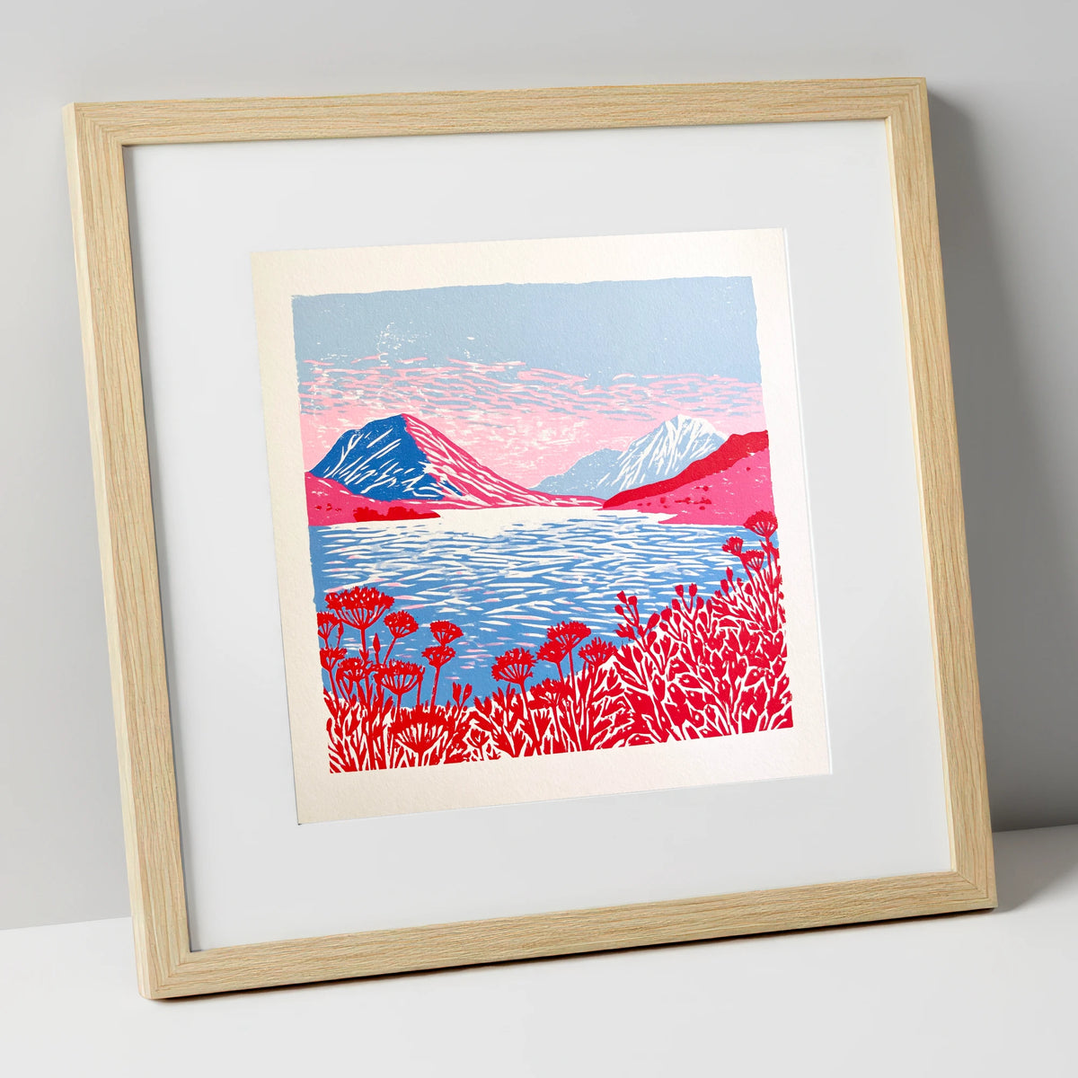 Crummock Water in Vivid Red lake district lake art print in natural frame