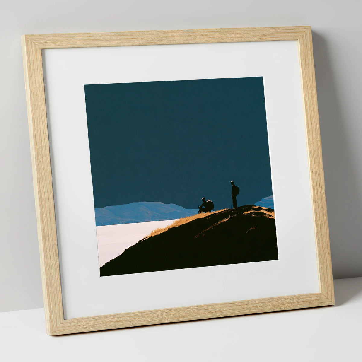 Silhouetted Walkers on Catbells lake district fell art print in natural frame