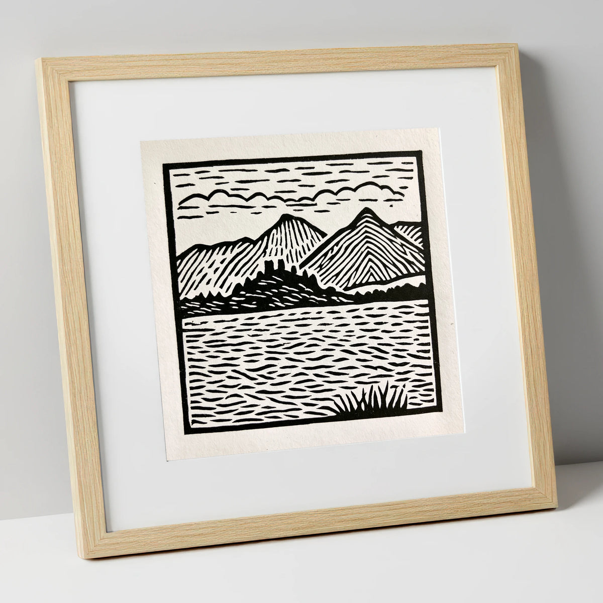 Monochrome Derwentwater Fells lake district lake art print in natural frame