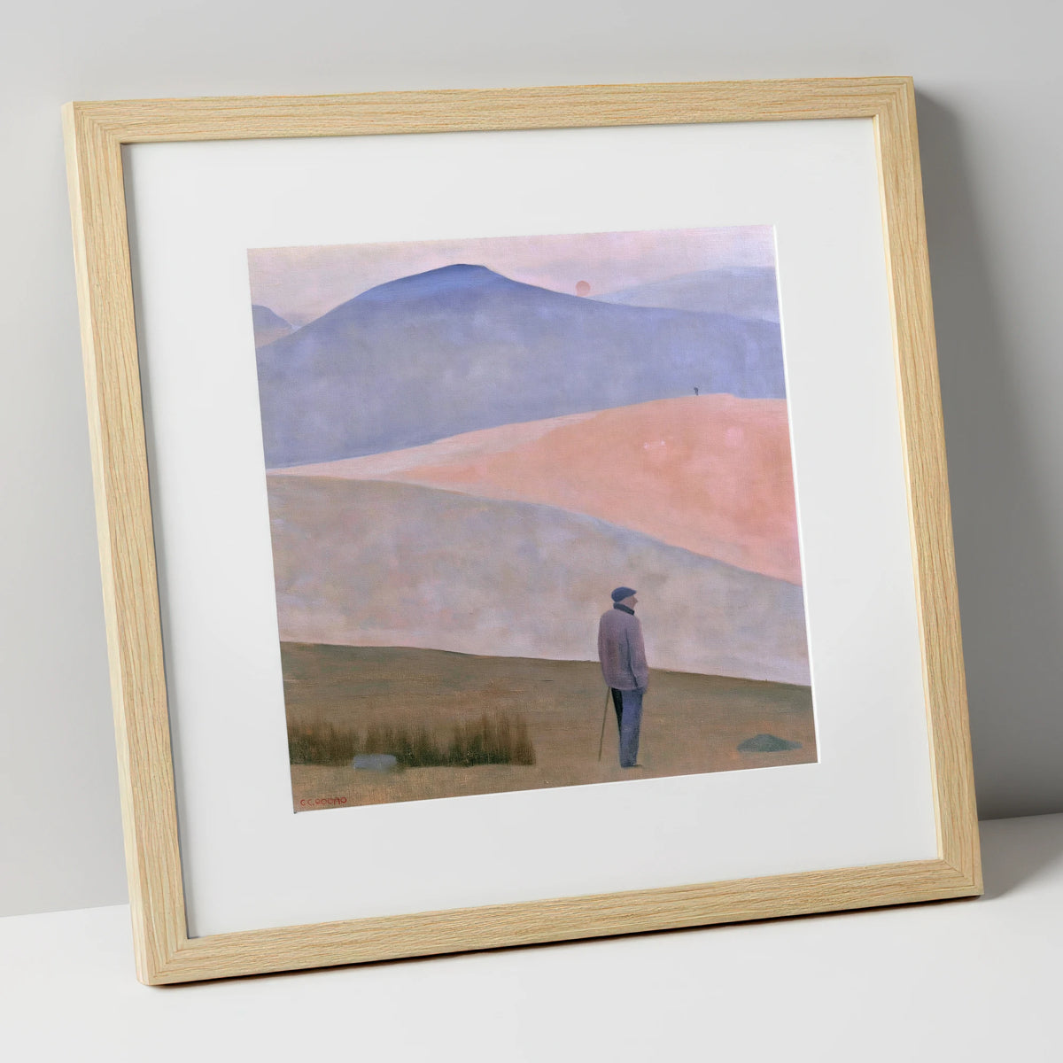 Lone Fell Walker at Dusk lake district walking art print in natural frame