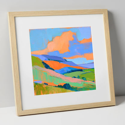 Orange Clouds Over Rolling Fells lake district fell art print in natural frame