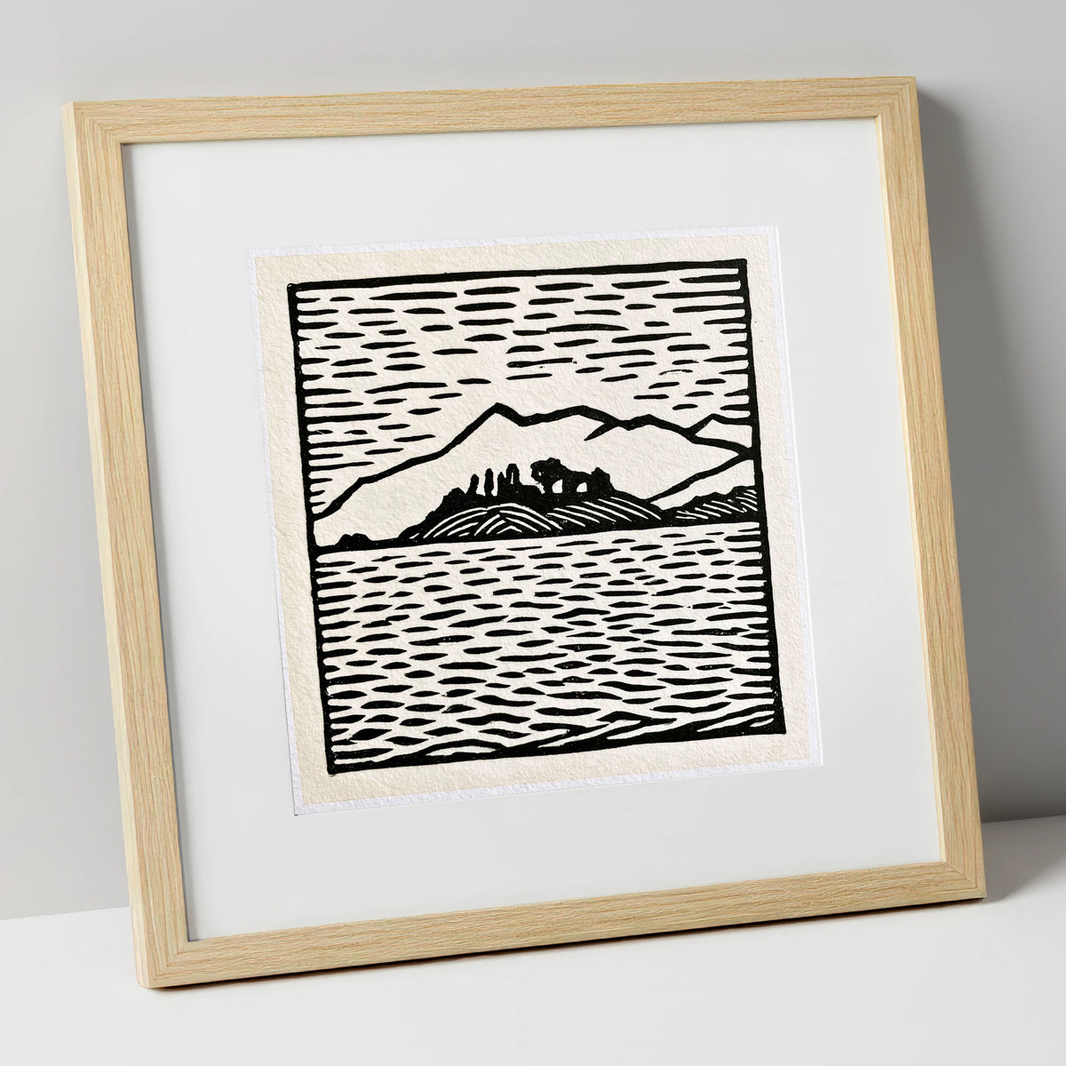 Bold Monochrome Derwentwater Island lake district lake art print in natural frame