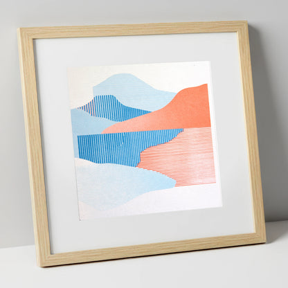 Graphic Lake Reflections In Coral lake district lake art print in natural frame