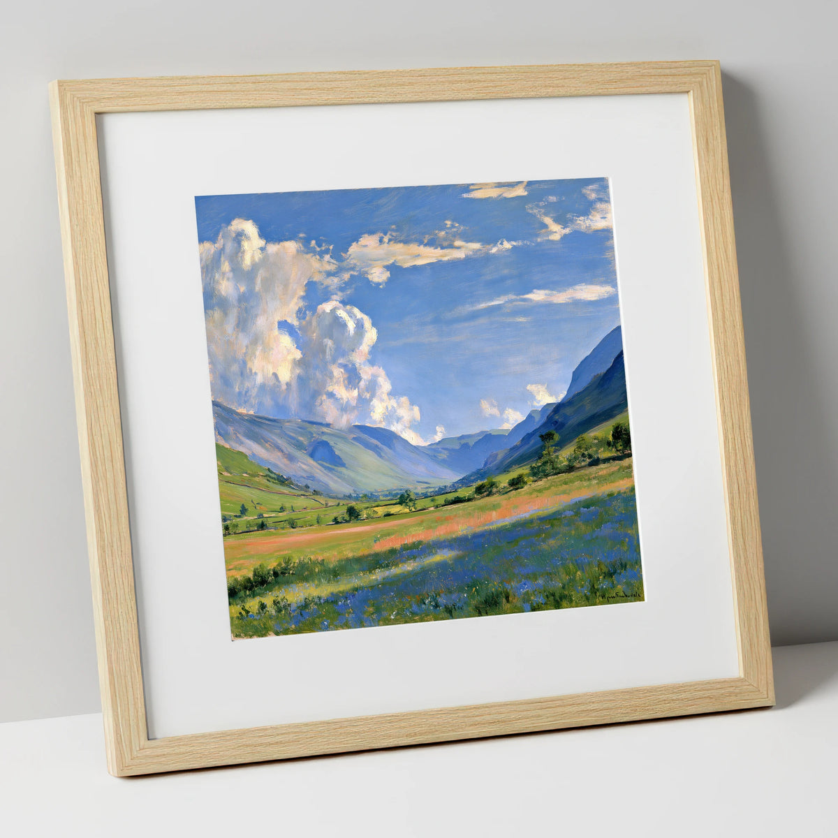 Sunlit Valley Under Billowing Clouds lake district valley art print in natural frame