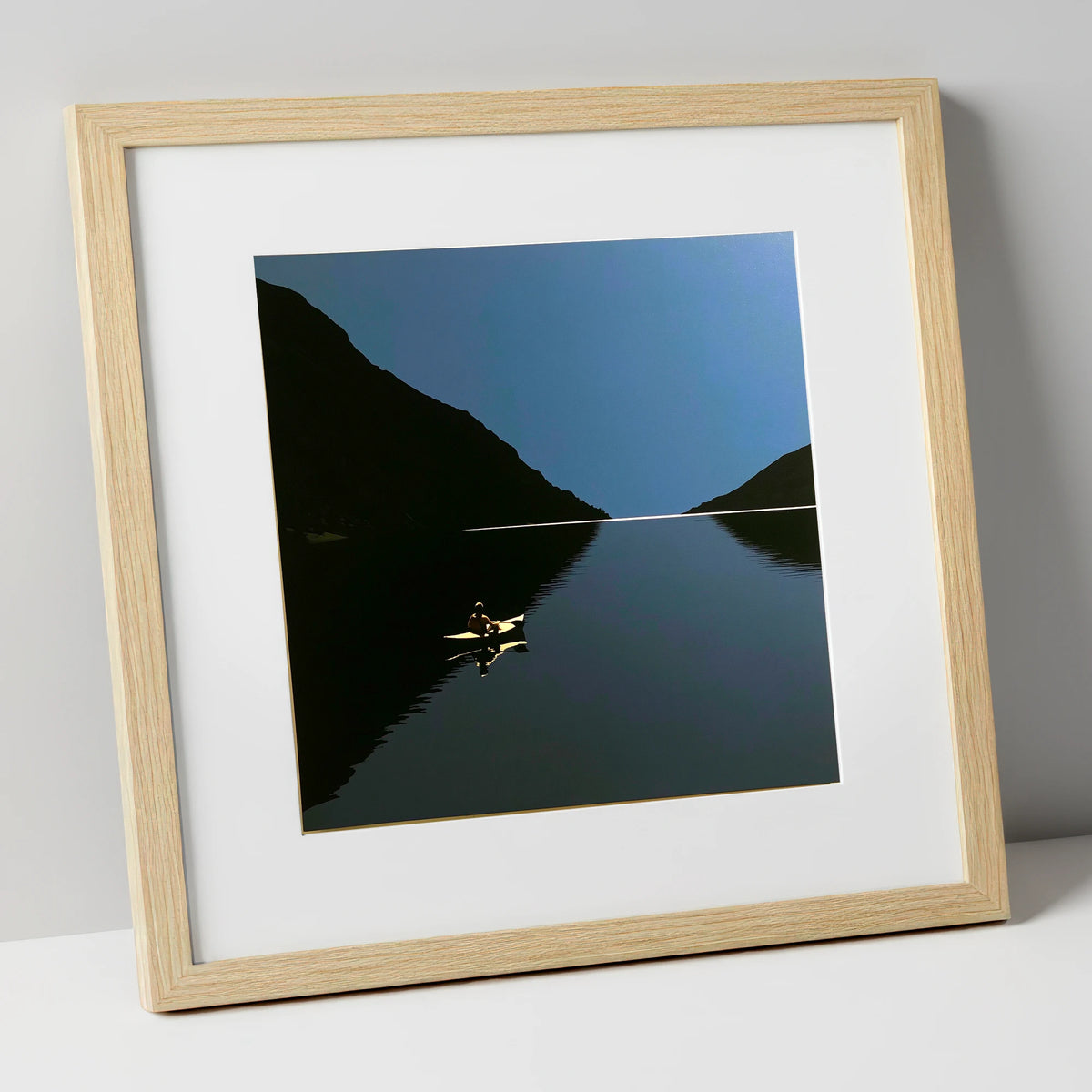 Illuminated Kayak on Dark Lake lake district walking art print in natural frame