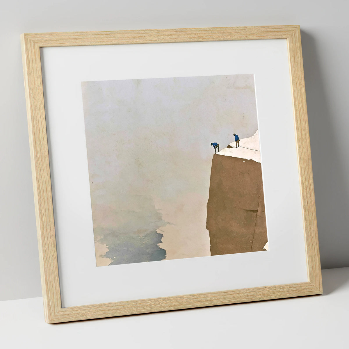 Climbers on a High Snowy Ledge lake district walking art print in natural frame