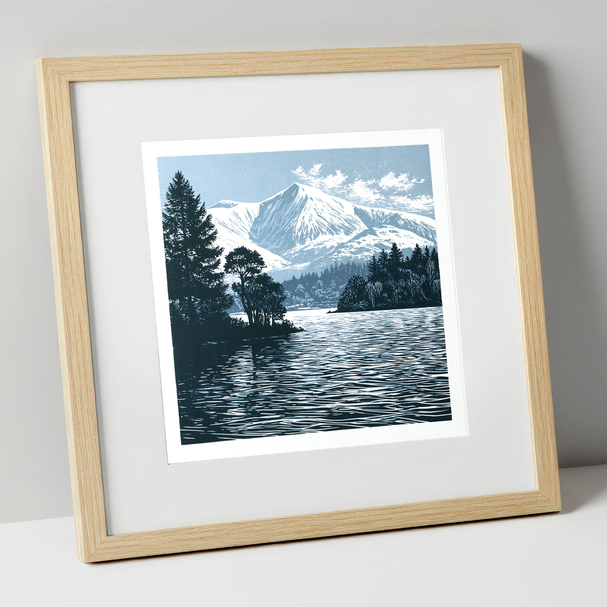 Winter Skiddaw in Deep Blue lake district fell art print in natural frame