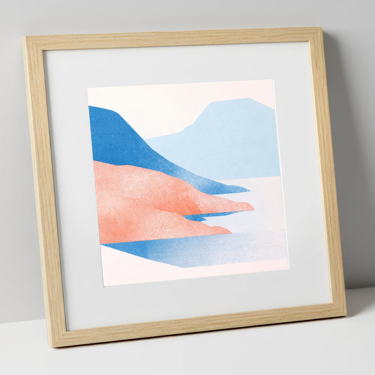 Coniston Water in Coral and Blue lake district lake art print in natural frame